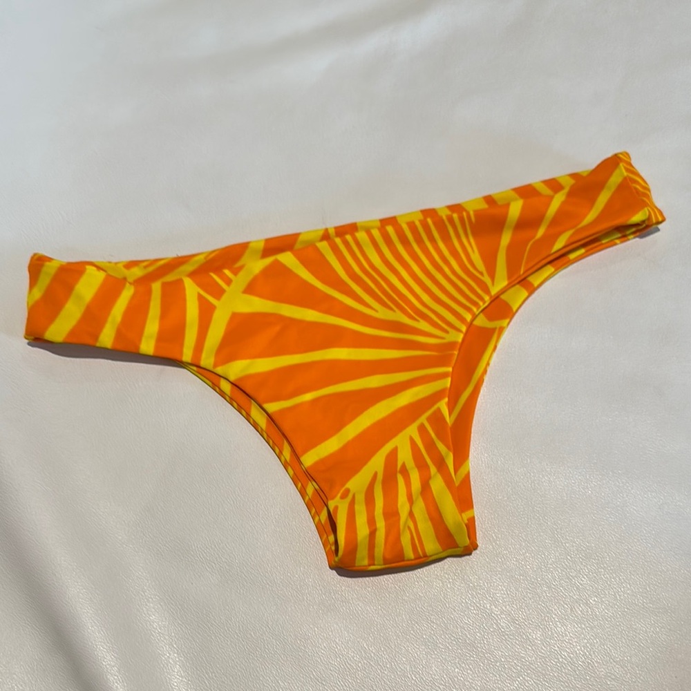 Women size small Vibrant Orange and Yellow Bikini Bottom reversible no elastic